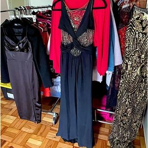 Vintage Valentino gown with embedded beading and see-through mesh. Zipper back